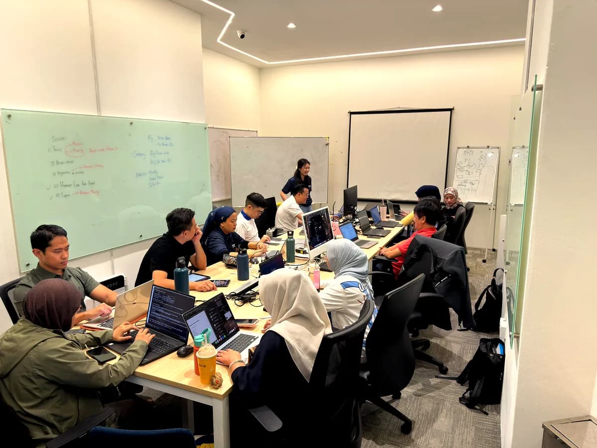 Participants practicing AI tools hands-on