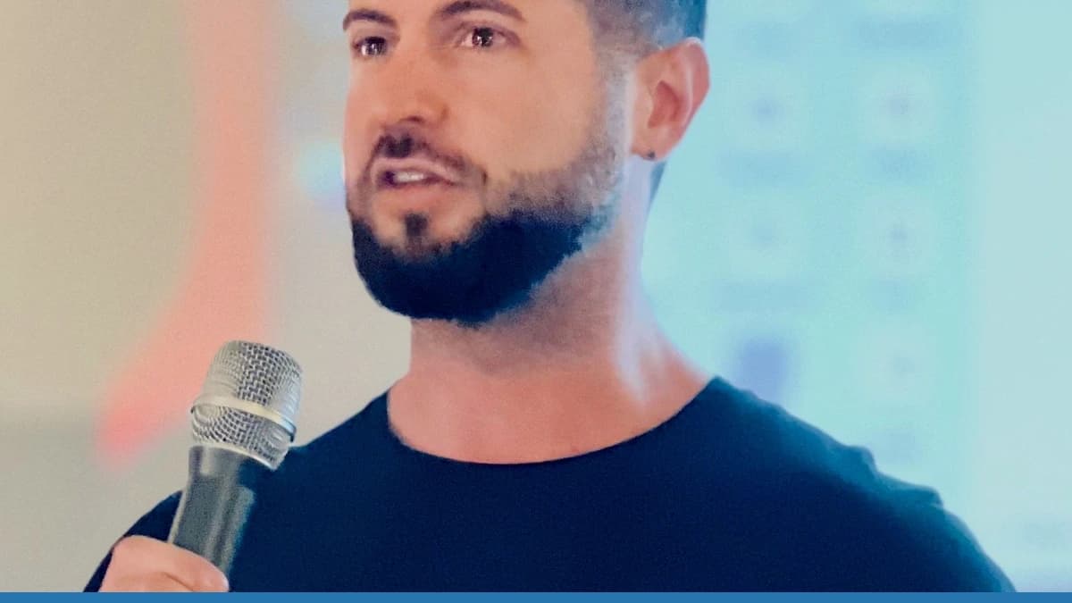 Michele Catasta, President and Head of AI at Replit, speaking with a microphone