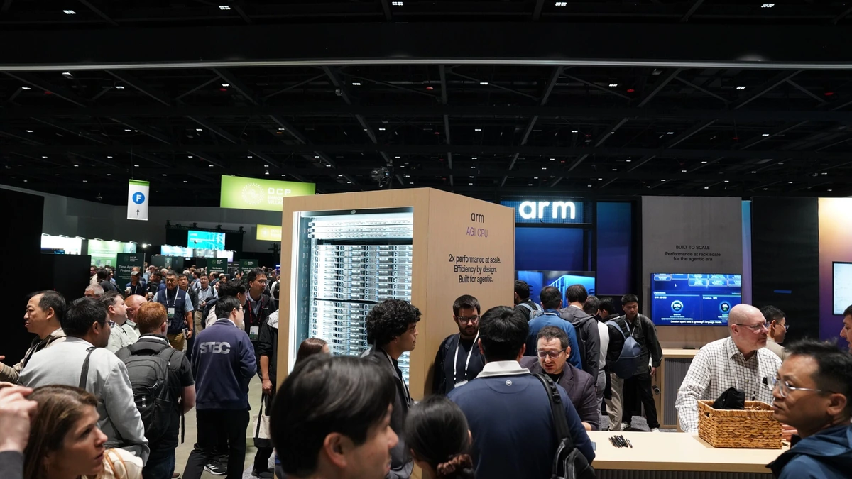 Visitors crowd the Arm booth at the OCP Global Summit 2026 in San Jose around a display rack