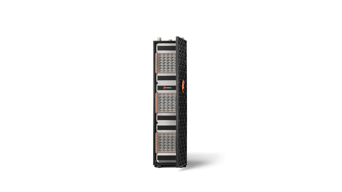 Front of the Cerebras CS-4 rack with its mesh door open to show equipment bays