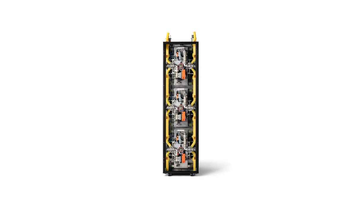 Rear view of the Cerebras CS-4 rack showing three stacked cooling assemblies